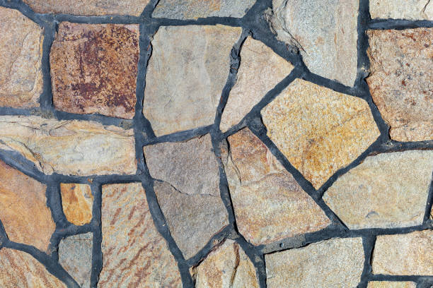 istock Imitation of a wild stone. Rough textured surface. Background 1343492795