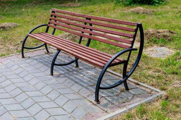 istock Empty bench in a city park. Background with copy space 1343492825