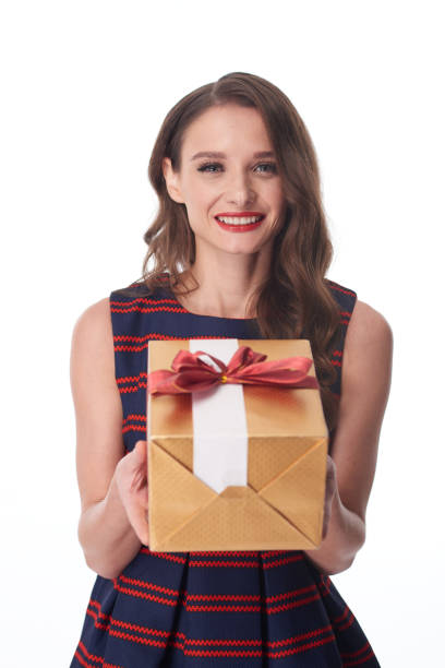 istock Beautiful Woman With Christmas Present 1343493222