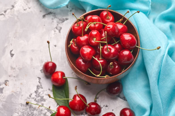 istock Ripe red and yellow cherries in bowl 1343495635