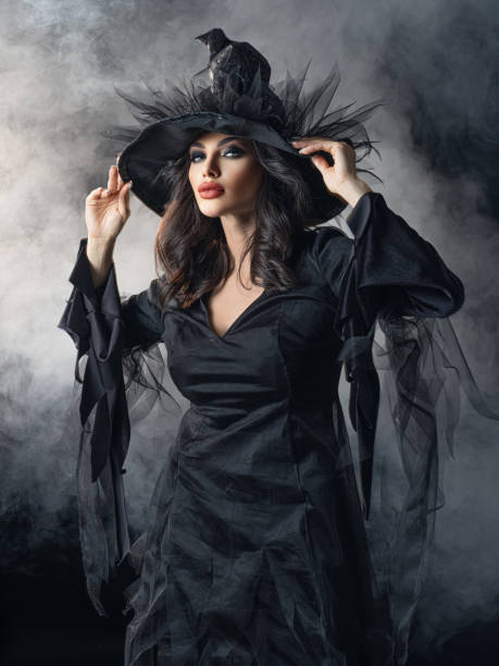 istock Woman in Halloween witch costume 1343495755