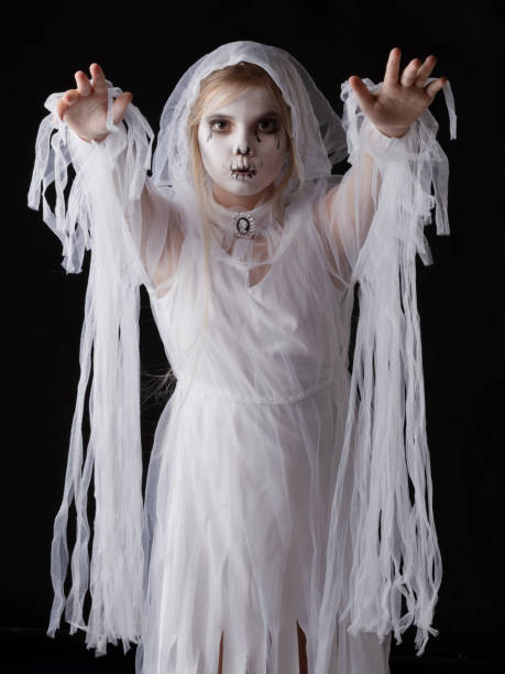 istock Girl in Halloween ghost costume 1343495774