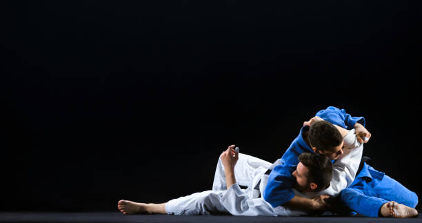 istock Judo players competing during match 1343495851