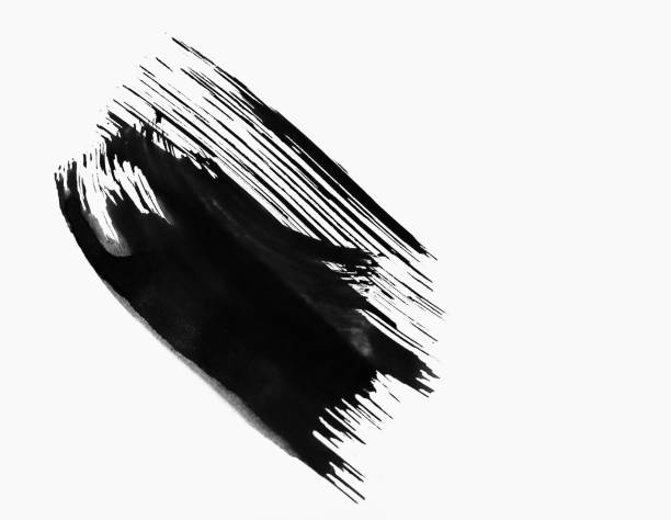 istock Black ink brush stroke isolated on white background. 1343496143