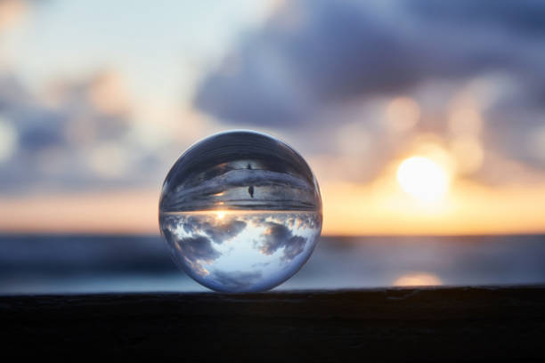 Magic sphere. Fortune teller, mind power concept. Crystal Ball reflecting water and sky