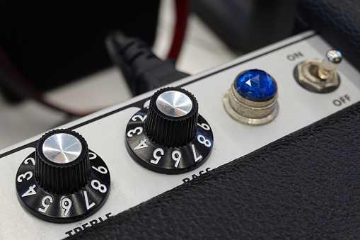 Close-up detail of sound volume controls from the amplifier.