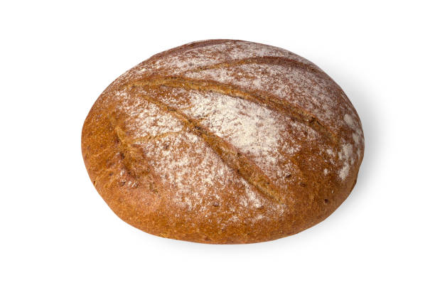 istock Round loaf of buckwheat bread isolated on white background 1343502304