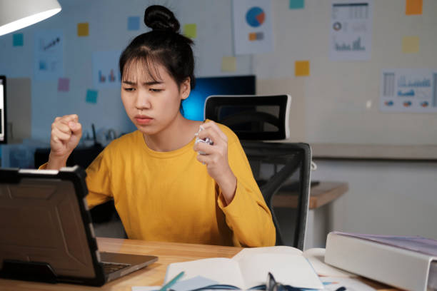 istock Angry overworked young woman in home office. 1343504969