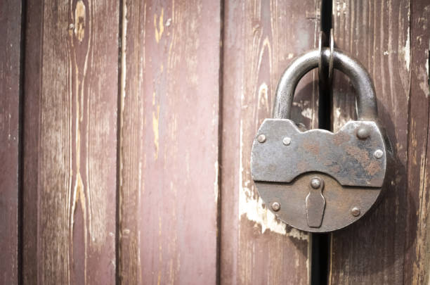 istock Iron castle. A closed lock hangs on the gate. 1343505053