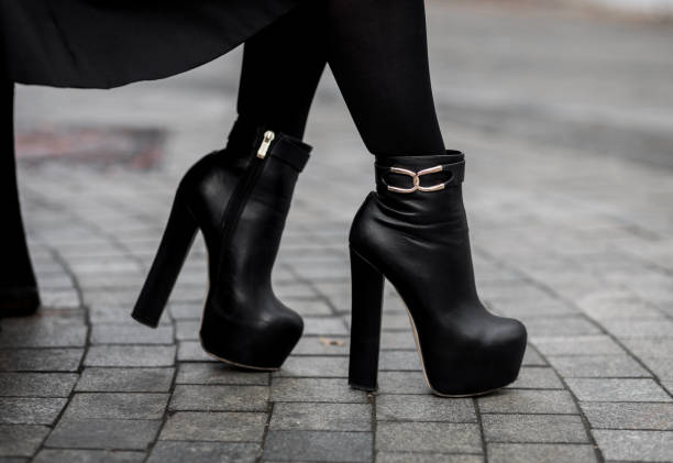 istock Closeup of stylish black ankle boots 1343507197