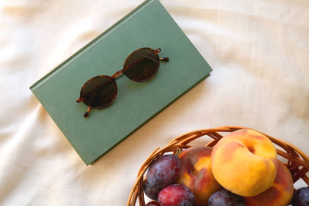 istock Picnic Basket, Book and Sunglasses 1343508238