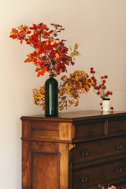 istock Autumn interior decoration with dry bouquet on wooden table 1343509579