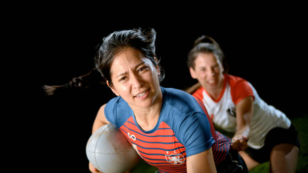 istock Rugby player tackling her opponent 1343513485