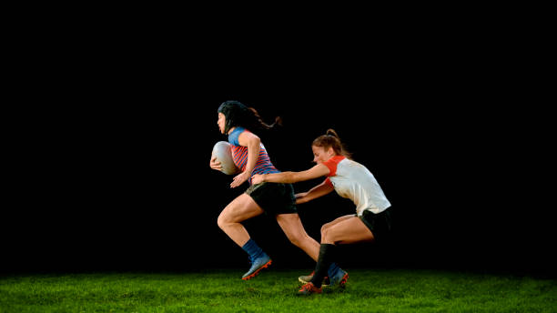 istock Rugby player tackling her opponent 1343513489