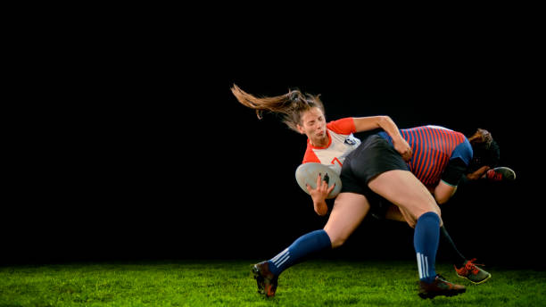 istock Rugby player tackling her opponent 1343513494