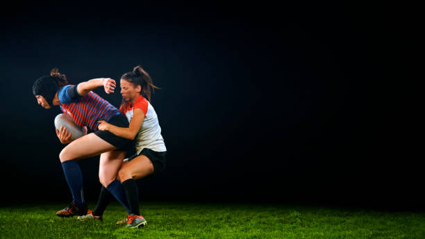 istock Rugby player tackling her opponent 1343513501