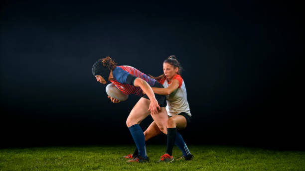 istock Rugby player tackling her opponent 1343513504
