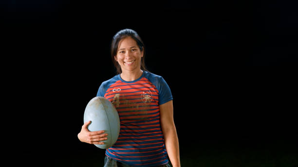 istock Close-up of rugby player standing with ball 1343513517