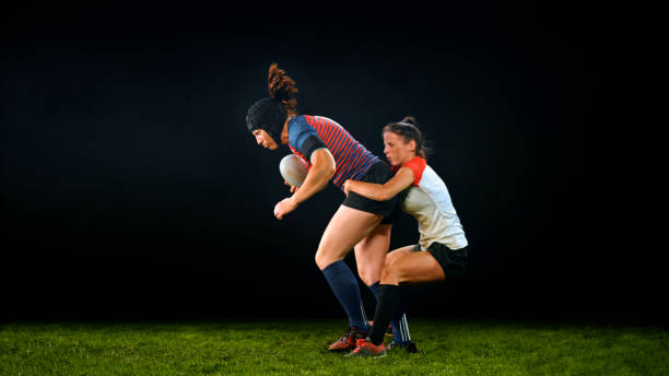 istock Rugby player tackling her opponent 1343513523