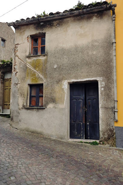 istock Old uninhabited house with broken glasses 1343517374