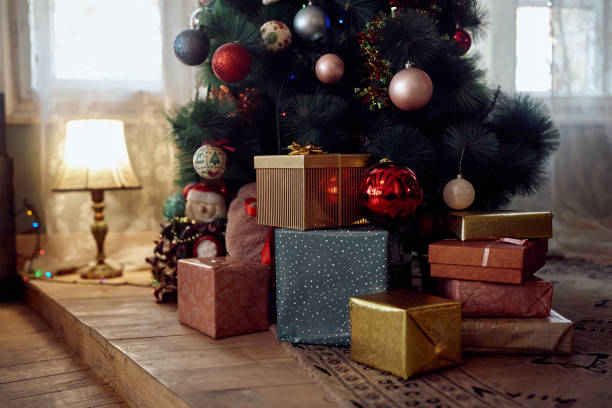 istock Wrapped gifts under the Christmas tree at home. 1343519182