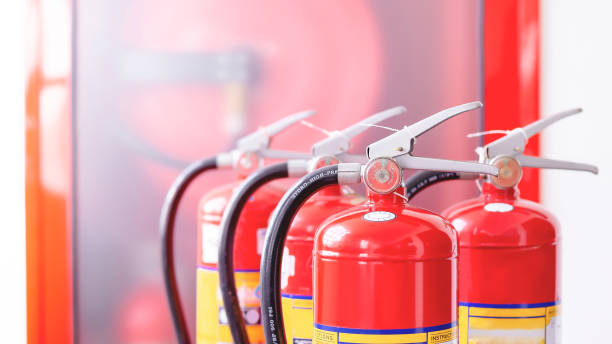 istock The red fire extinguisher is ready for use in case of an indoor fire emergency. 1343519317