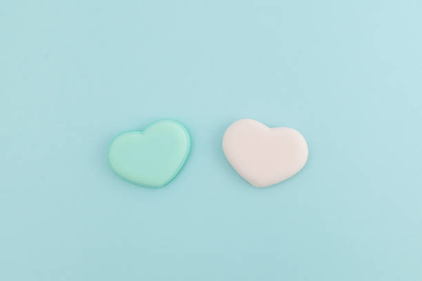 istock Sponges foundation for makeup in shape of hearts. Soft application 1343520286