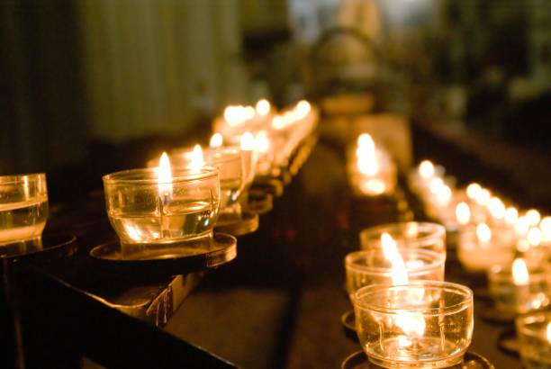 istock rows of candles in the darkness 1343521473