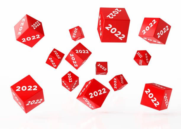 istock New Year Concept - 2022 Written Red Cubes Are Falling Over White Background 1343521541
