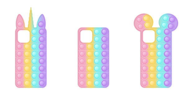 A set of mobile phone cases in the form popit toys for fidgets. The covers in pastel rainbow colors with unicorn and ears and a simple shape. Vector illustration isolated on a white background. A set of mobile phone cases in the form popit toys for fidgets. The covers in pastel rainbow colors with unicorn and ears and a simple shape. Vector illustration isolated on a white background phone cover isolated stock illustrations