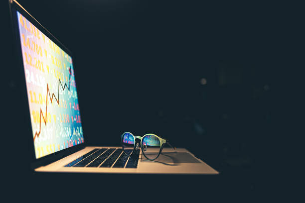 istock Stock market graph, financial data on an electronic board on a laptop screen. 1343528107