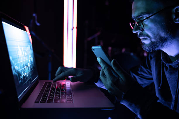 istock A man analyzing stock market charts, financial data on an electronic board. 1343528108