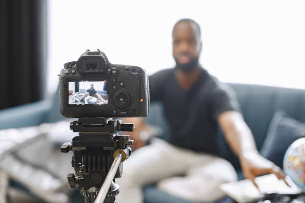 istock African male blogger recording vlog on digital camera 1343528581