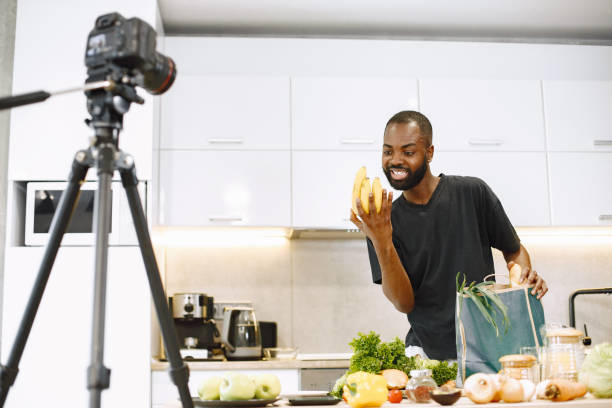 istock African male blogger recording vlog on digital camera 1343529150