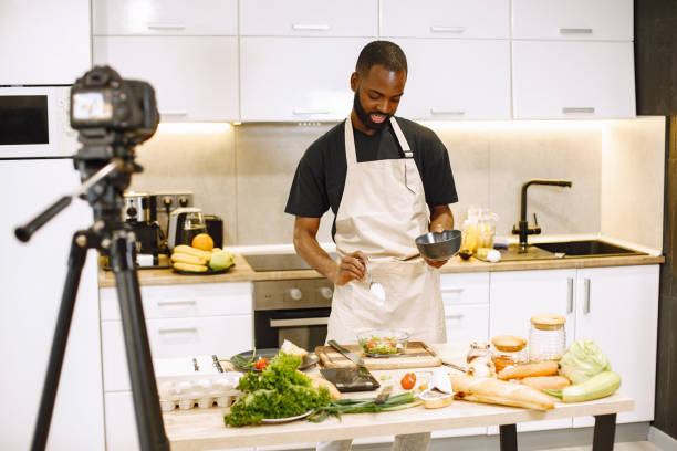 istock African male blogger recording vlog on digital camera 1343529204