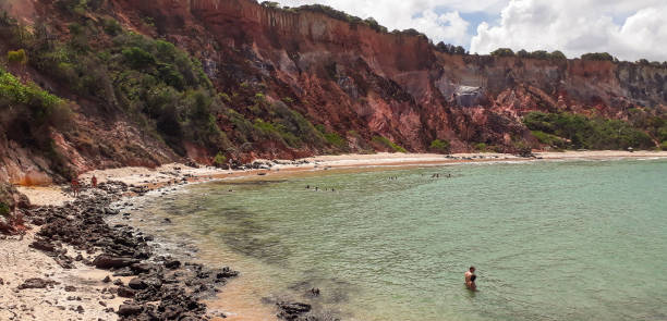 istock orange cliffs in Tabatinga Beach. Conde, Paraiba, Brazil 1343531344