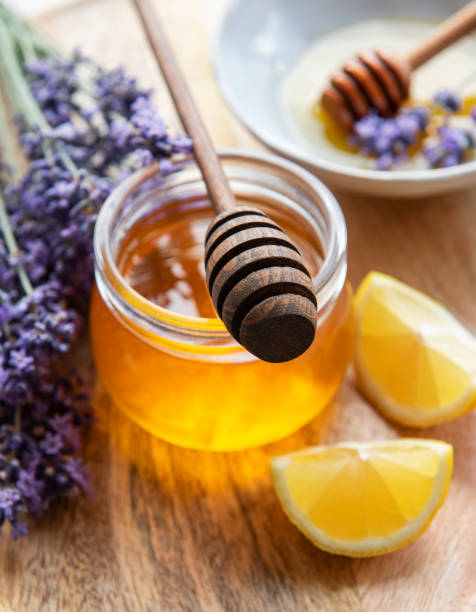 istock Jar with honey and fresh lavender flowers 1343539564