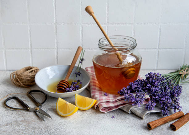 istock Jar with honey and fresh lavender flowers 1343539567