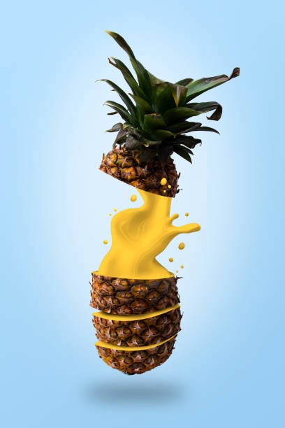 istock Ripe pineapple flying on light orange background with copy space. 1343541270