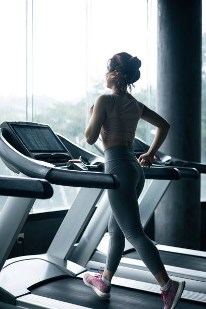 istock Young woman training in the gym 1343542631