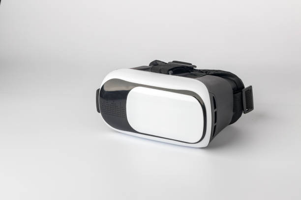 istock Virtual reality helmet on white background. virtual reality glasses (vr) half turned. VR virtual reality headset. 1343544633