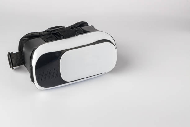 istock Virtual reality helmet on white background. virtual reality glasses (vr) half turned. VR virtual reality headset. 1343544640