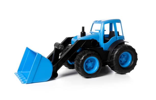 istock plastic toy tractor isolated on white background 1343545788
