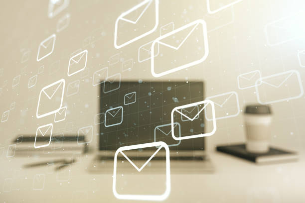 istock Double exposure of postal envelopes hologram on laptop background. Electronic mail and spam concept 1343547295
