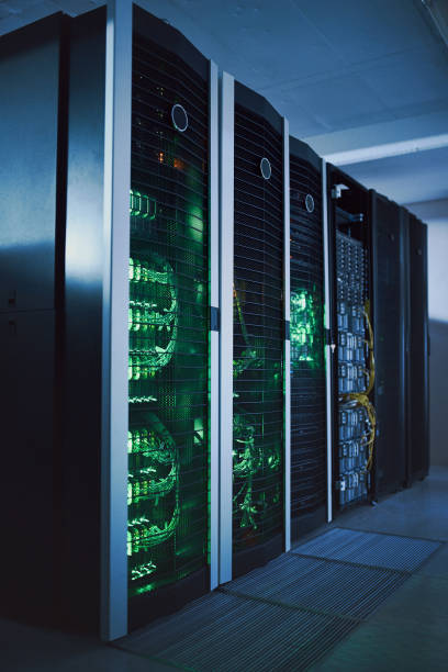 istock Shot of electronic equipment in an empty server room 1343548135