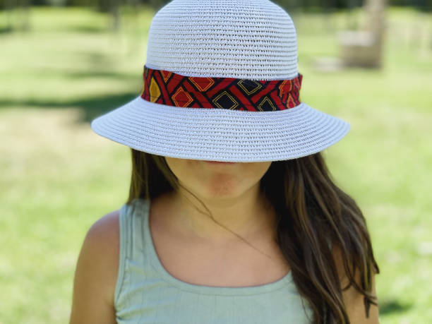 istock The girl and the hat 1343548728