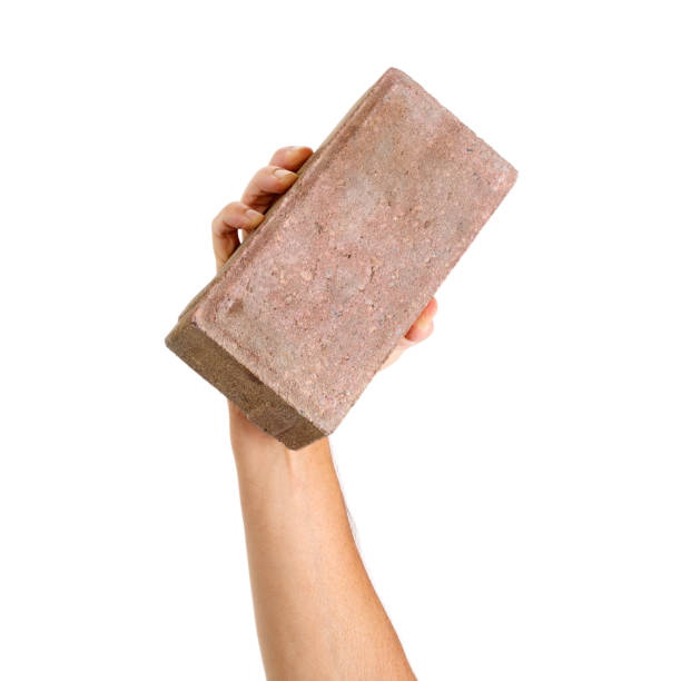 Small brick wall on blue background.