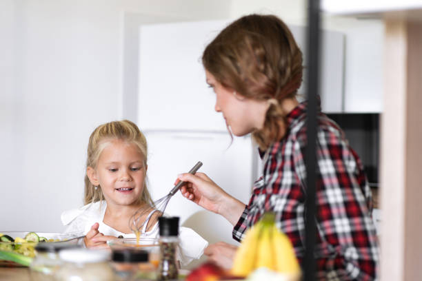 istock A mother and daughter in the kitchen 1343549099