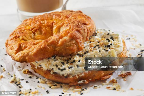 Cheese Bagel With Cream Cheese And Everything Bagel Seasoning Stock Photo - Download Image Now