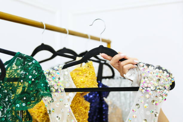 istock hand hold hanger with luxury dress 1343549311